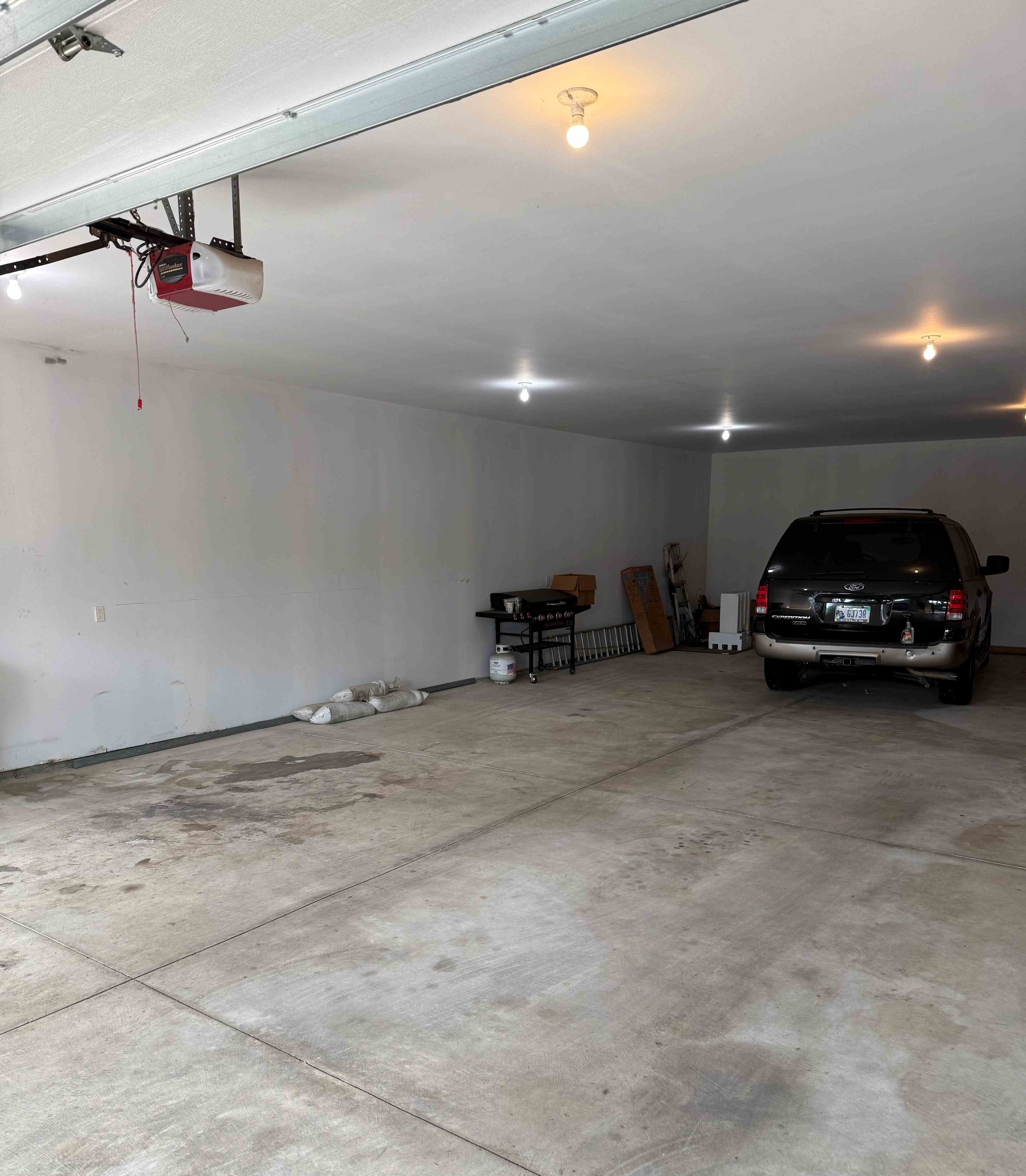 Garage after transformation — clean, organized, epoxy floor